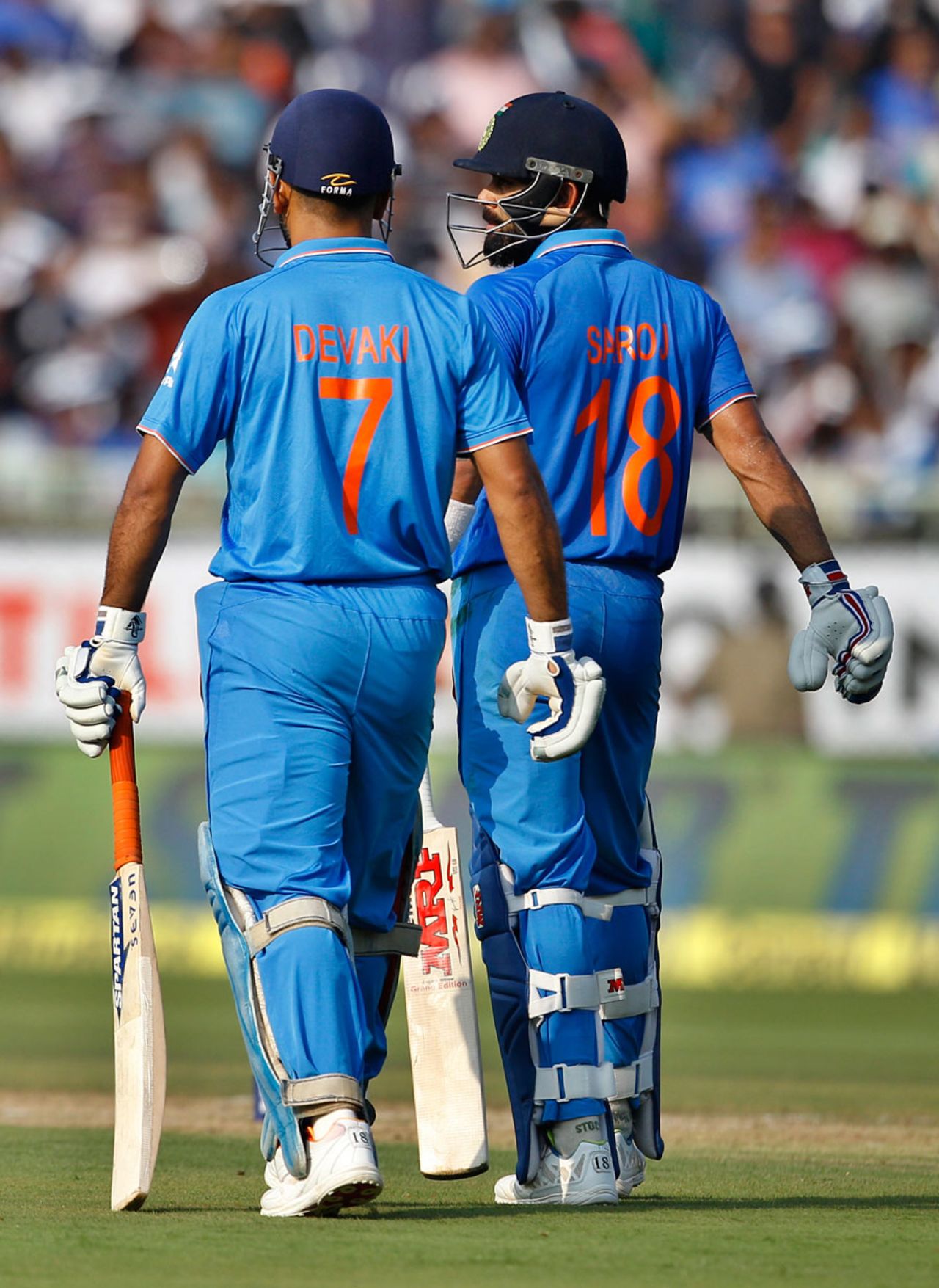 MS Dhoni and Virat Kohli (seen here wearing shirts bearing their mothers' names) added 71 in partnership, India v New Zealand, 5th ODI, Visakhapatnam, October 29, 2016