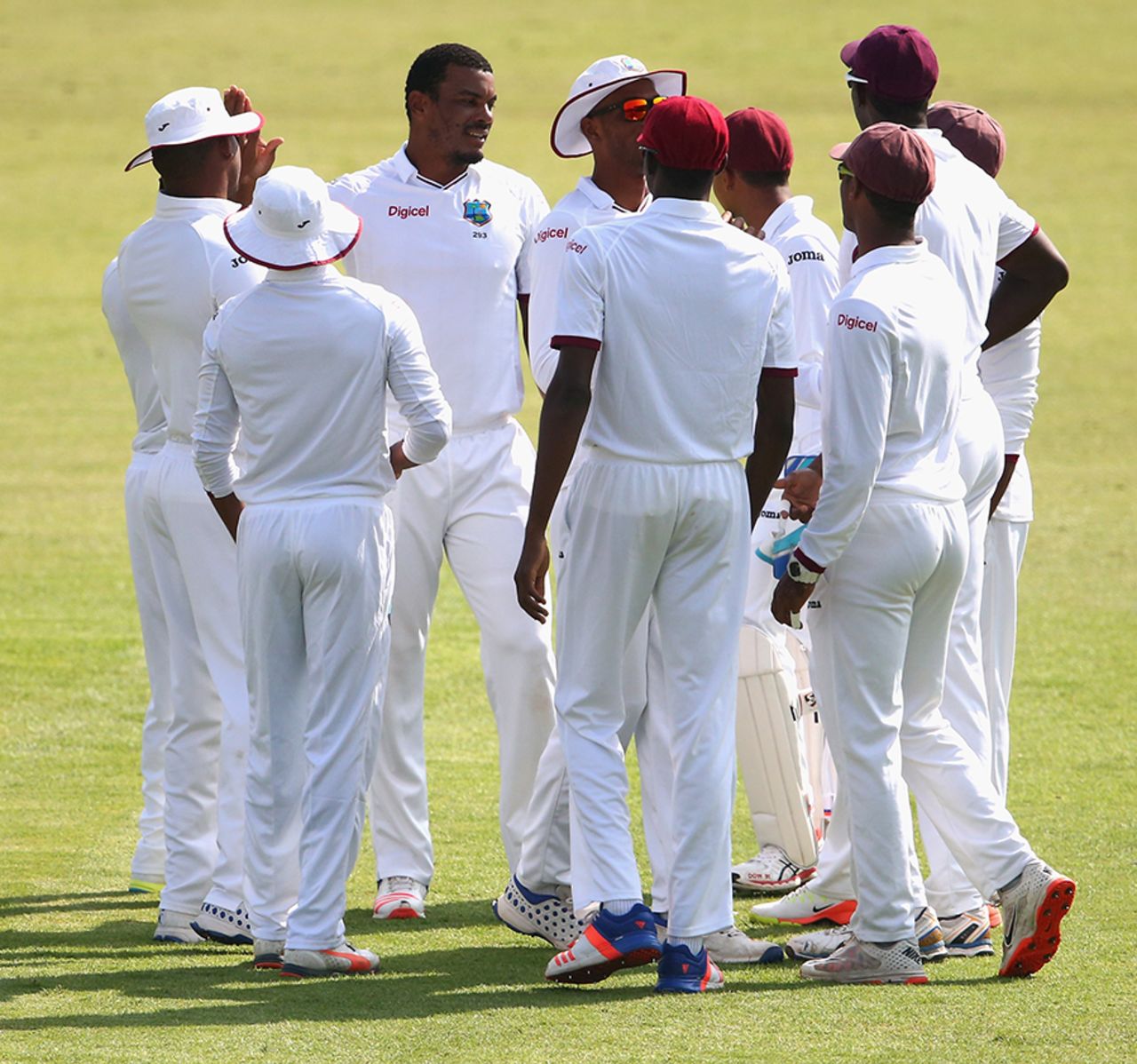 Team-mates surround Shannon Gabriel to celebrate a wicket, Pakistan v West Indies, 3rd Test, Sharjah, 1st day, October 30, 2016