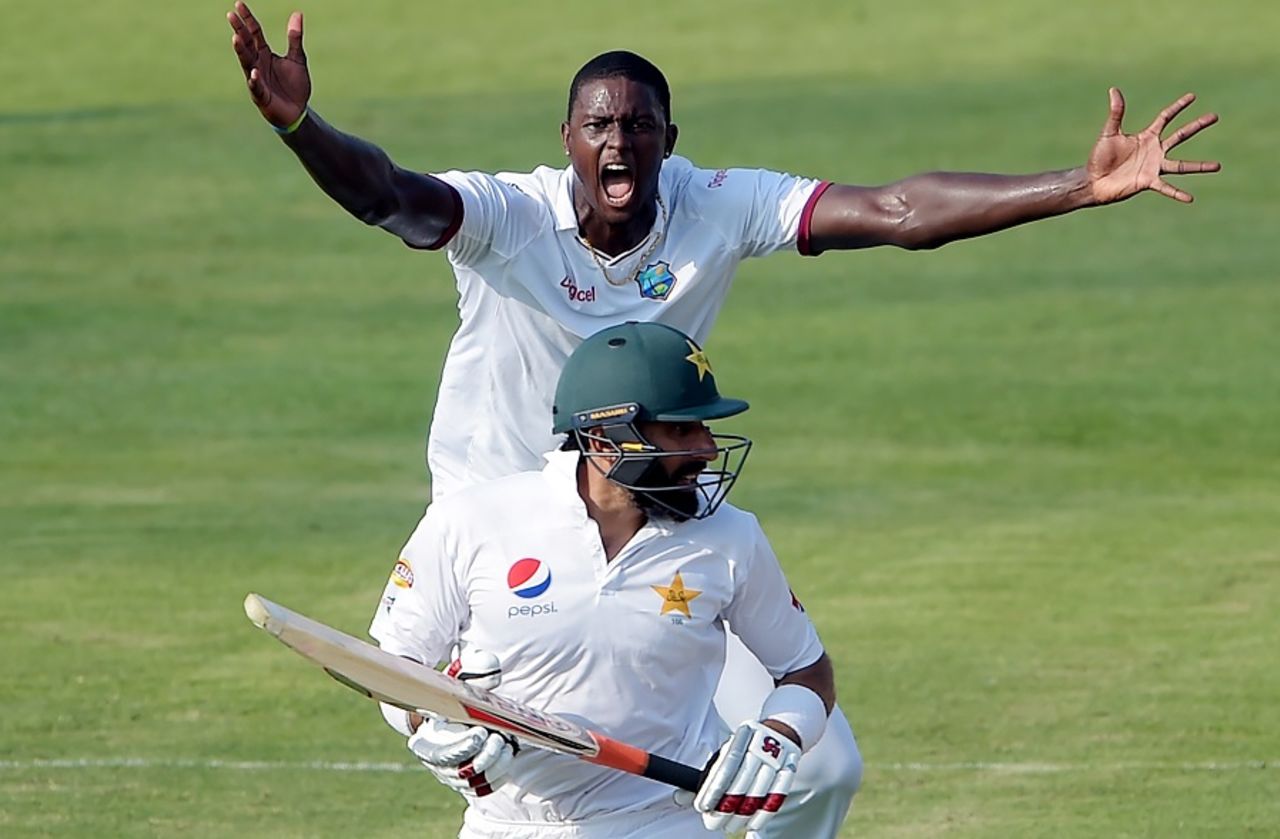 Jason Holder is in the middle of an animated appeal as Misbah-ul-Haq runs past, Pakistan v West Indies, 3rd Test, Sharjah, 1st day, October 30, 2016