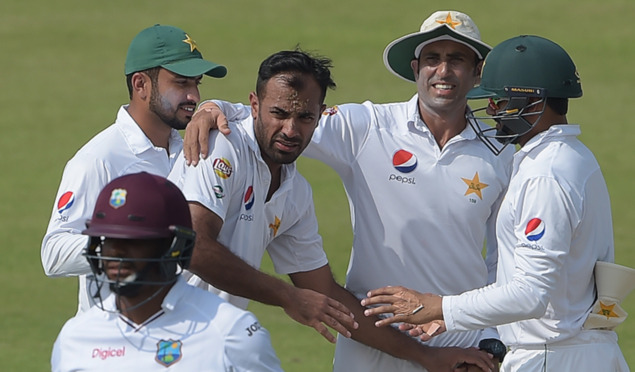 Pakistan players congratulate Wahab Riaz on his five-for after dismissing Shannon Gabriel, Pakistan v West Indies, 3rd Test, Sharjah, 3rd day, November 1, 2016