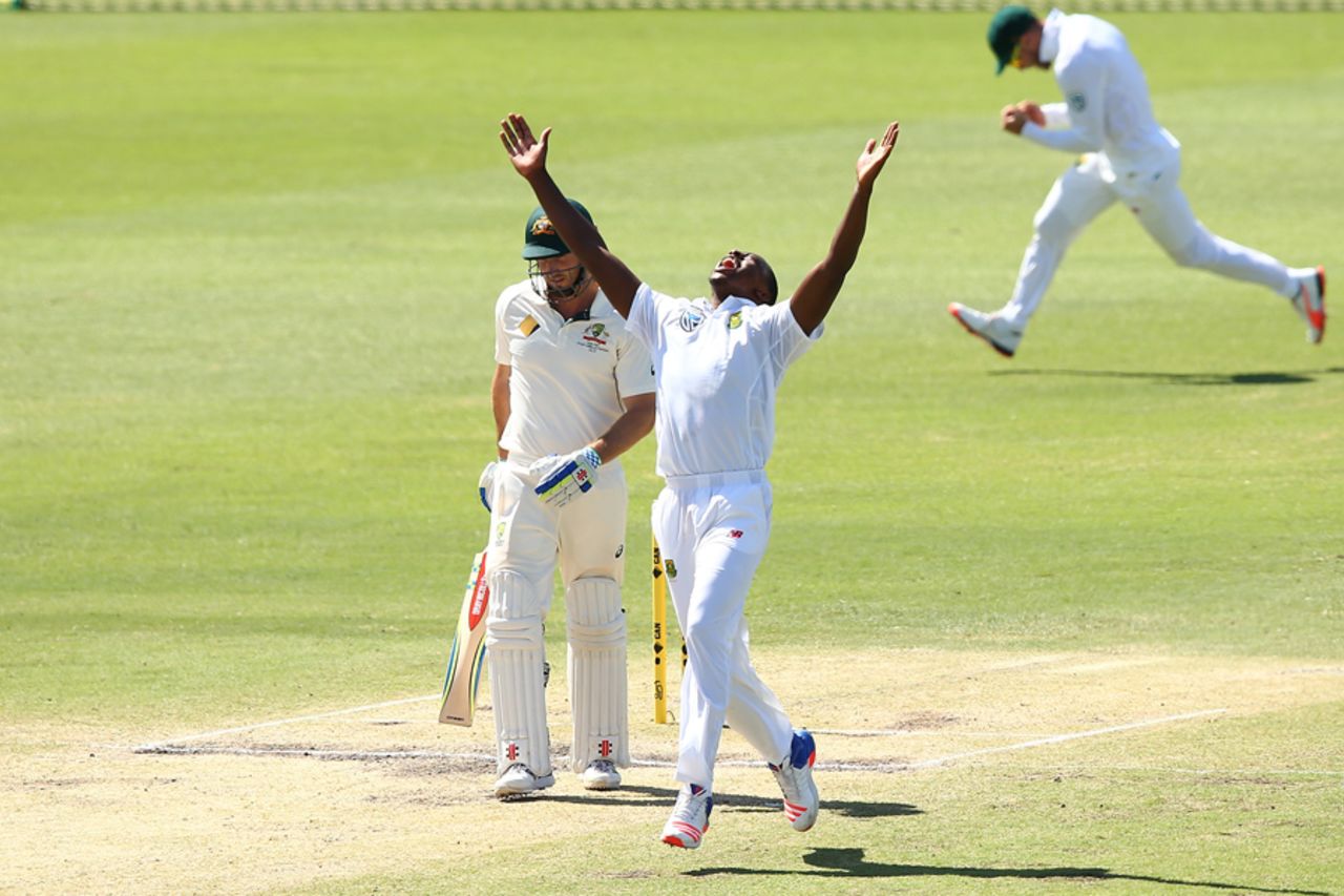 Kagiso Rabada delights in the wicket of Shaun Marsh, Australia v South Africa, 1st Test, Perth, 4th day, November 6, 2016