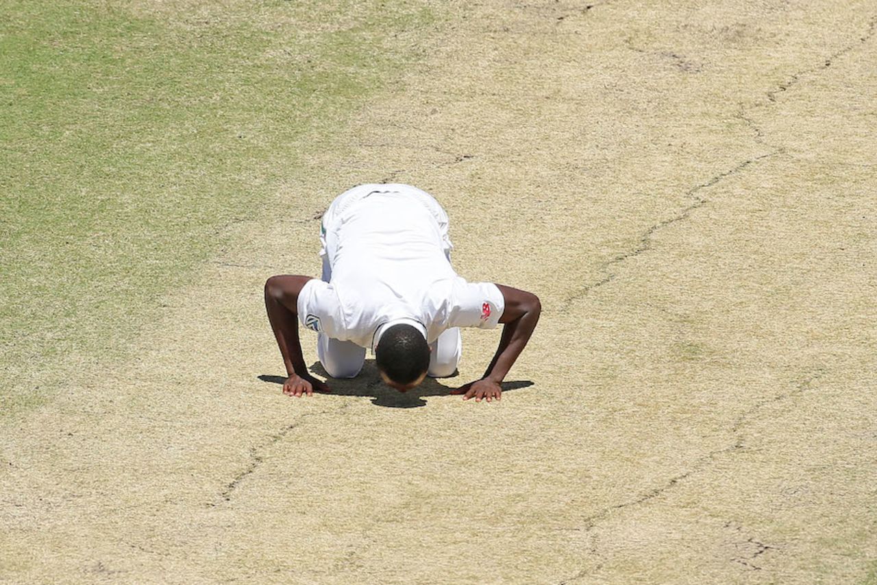 Kagiso Rabada kisses the pitch after taking his fifth wicket, Australia v South Africa, 1st Test, Perth, 5th day, November 7, 2016