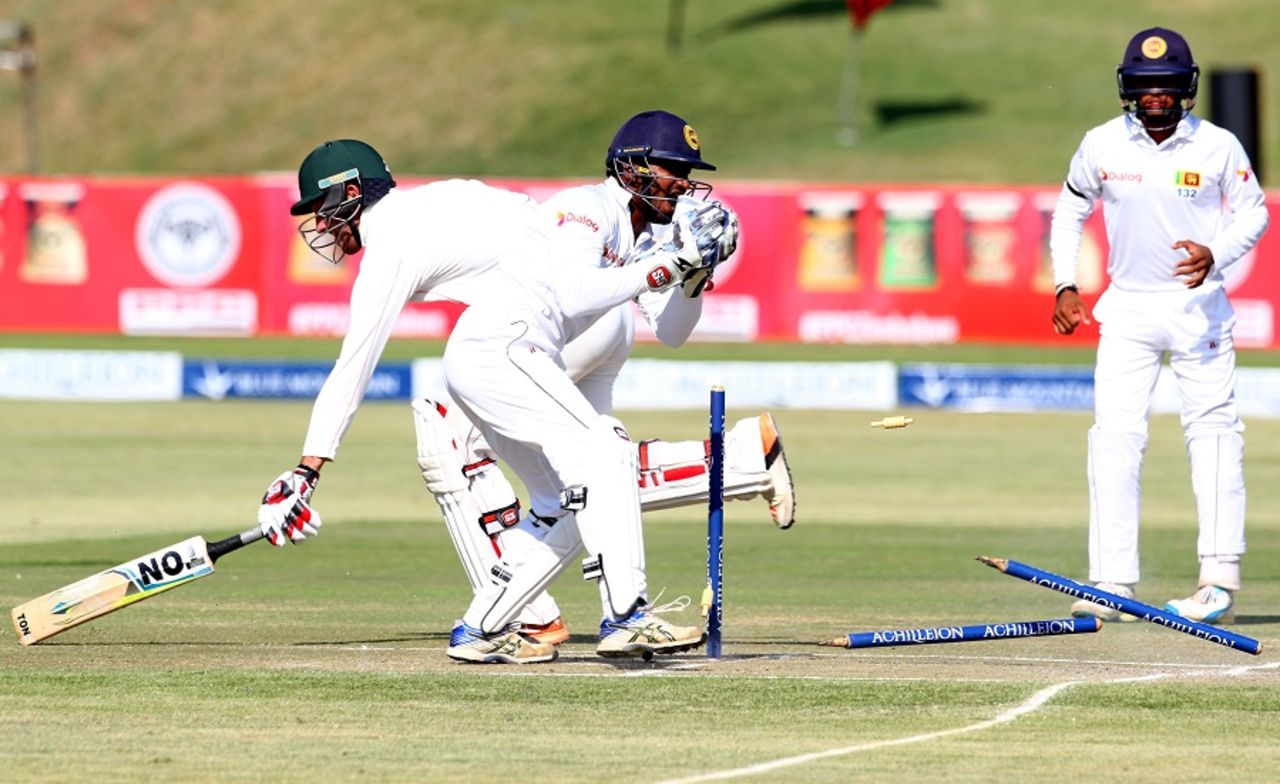 Kusal Perera attempts a run out of Craig Ervine, Zimbabwe v Sri Lanka, 2nd Test, Harare, 2nd day, November 7, 2016