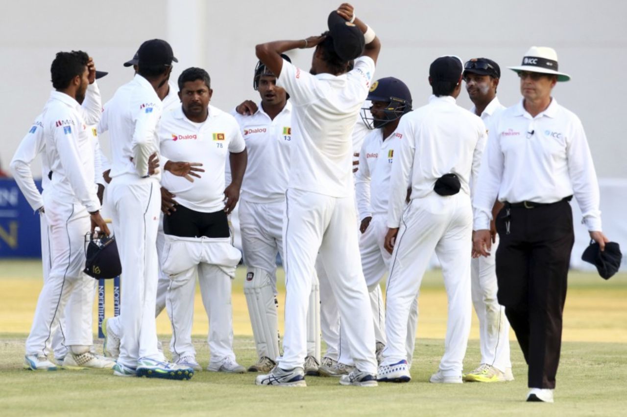 Rangana Herath and his team celebrate a wicket, Zimbabwe v Sri Lanka, 2nd Test, Harare, 4th day, November 9, 2016