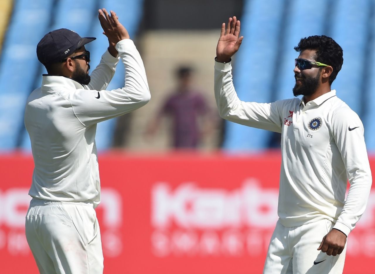 Virat Kohli and Ravindra Jadeja celebrate a wicket, India v England, 1st Test, Rajkot, 2nd day, November 10, 2016
