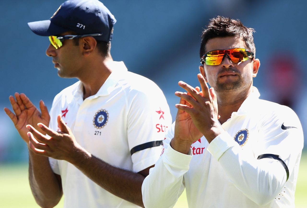 R Ashwin and Suresh Raina applaud during the tribute to Phillip Hughes, Australia v India, first Test, day one, Adelaide, December 9, 2014
