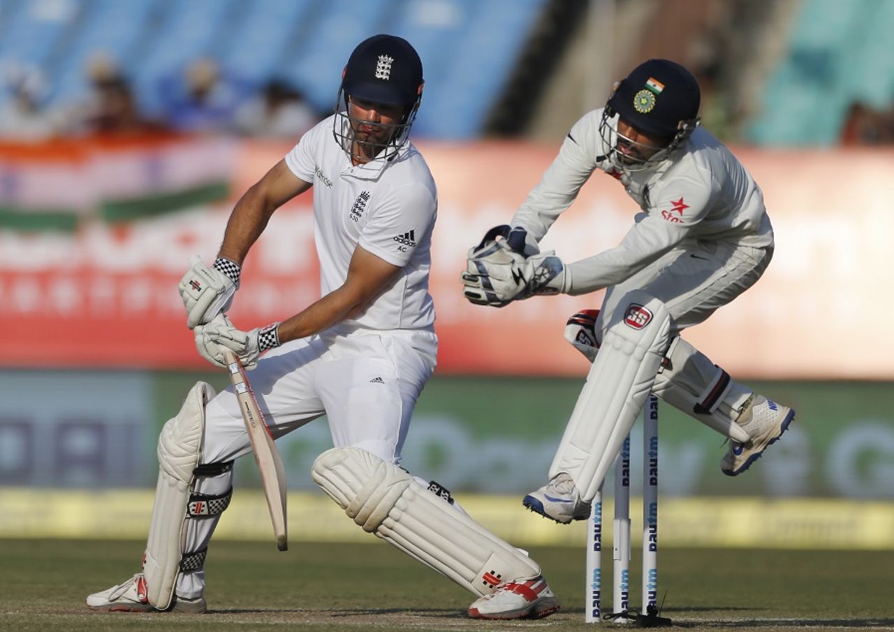 Wriddhiman Saha jumps up to collect the ball even as Alastair Cook tries to guide it to the off side, India v England, 1st Test, Rajkot, 4th day, November 12, 2016