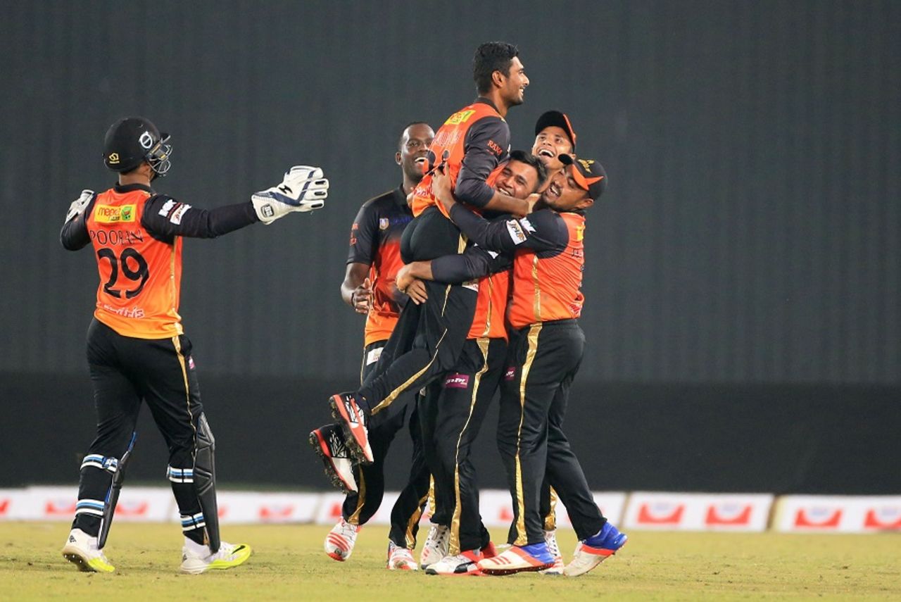 Mahmudullah is mobbed by team-mates after he bowled Khulna to a four-run win, Chittagong Vikings v Khulna Titans, BPL 2016-17, Mirpur, November 12, 2016