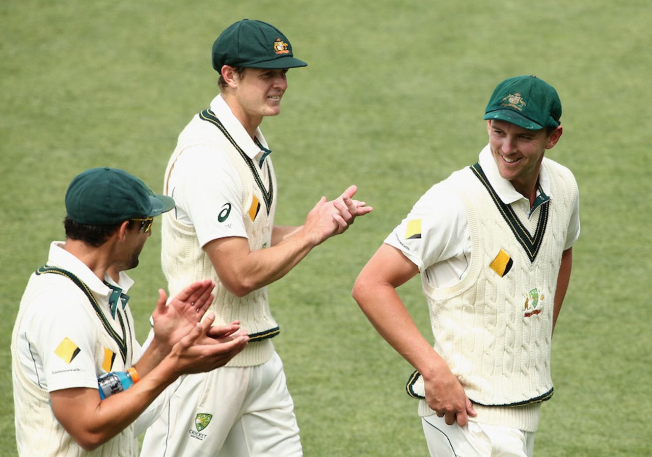 Mitchell Starc and Joe Mennie applaud Josh Hazlewood off the field, Australia v South Africa, 2nd Test, Hobart, 3rd day, November 14, 2016