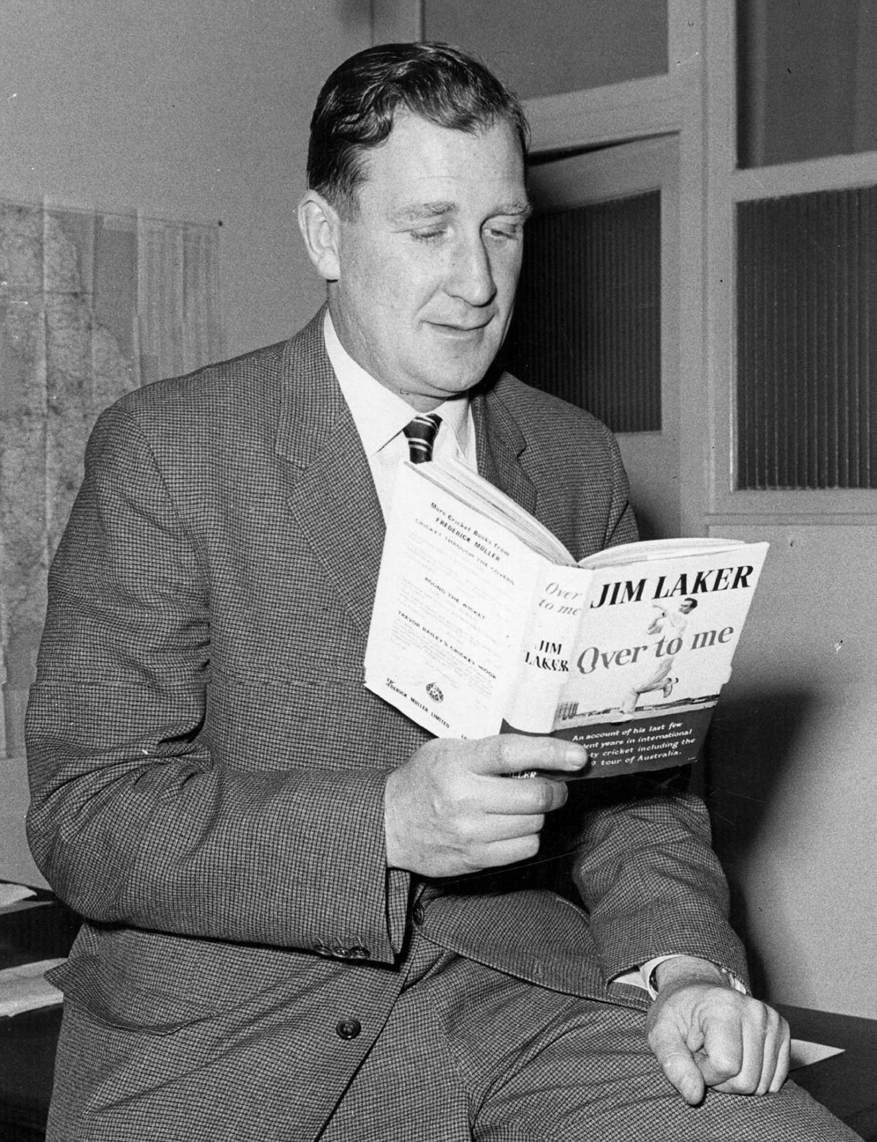 Jim Laker reads his book, Over to Me, May 1960