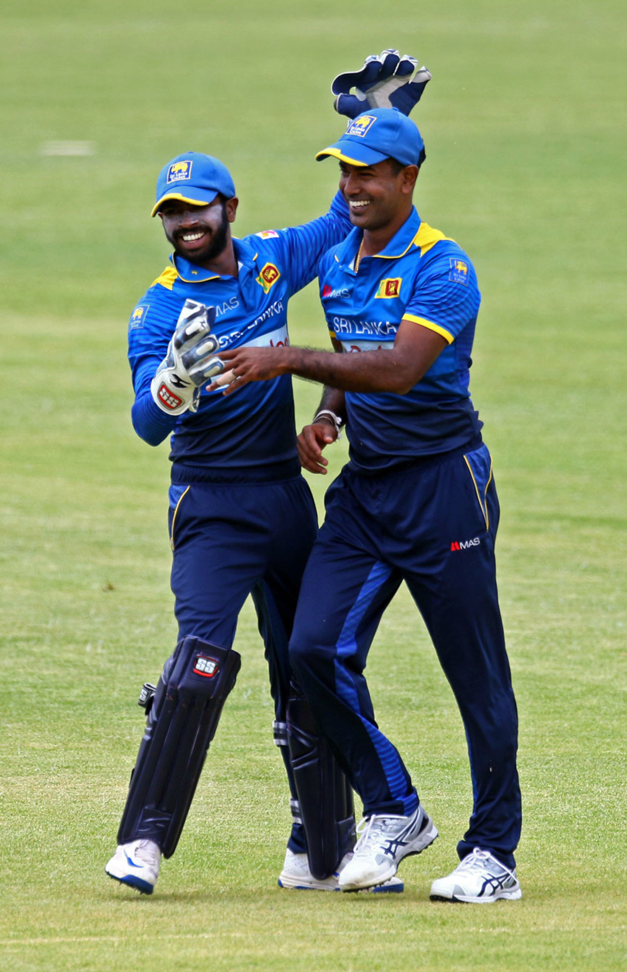 Niroshan Dickwella congratulates Nuwan Kulasekara on running out Kraigg Brathwaite, Sri Lanka v West Indies, Zimbabwe tri-series, Harare, November 16, 2016