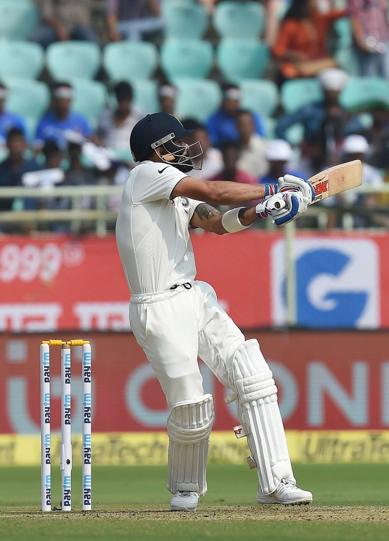 Virat Kohli attempts a pull shot, India v England, 2nd Test, Visakhapatnam, 1st day, November 17, 2016