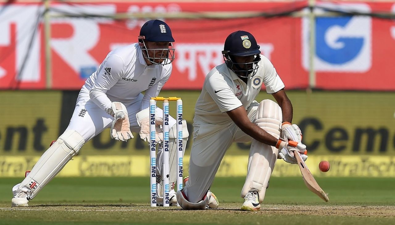 R Ashwin gets down for a paddle sweep, India v England, 2nd Test, Visakhapatnam, 2nd day, November 18, 2016