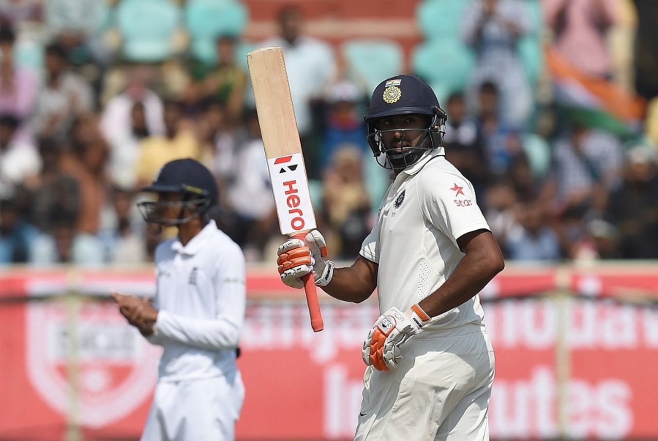 R Ashwin raises his bat after reaching his eighth Test fifty, India v England, 2nd Test, Vishakapatnam, 2nd day, November 18, 2016