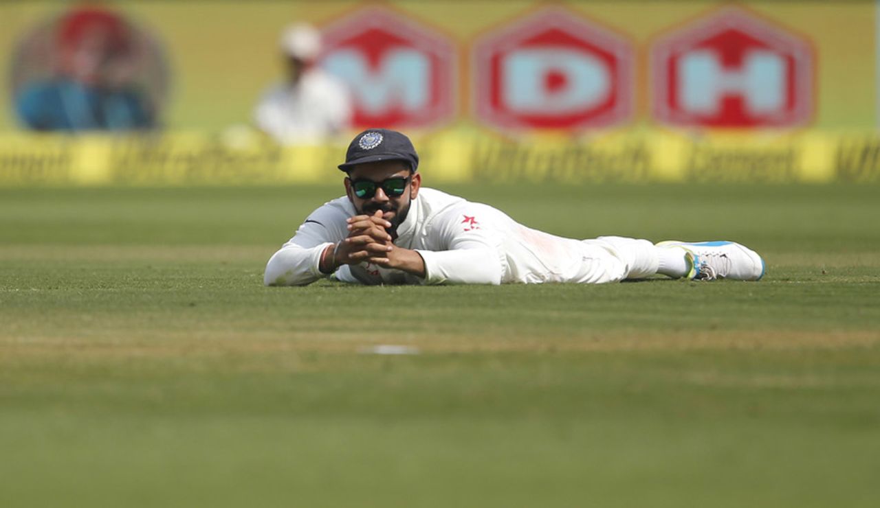 Virat Kohli watches on after a misfield, India v England, 2nd Test, Visakhapatnam, 3rd day, November 19, 2016