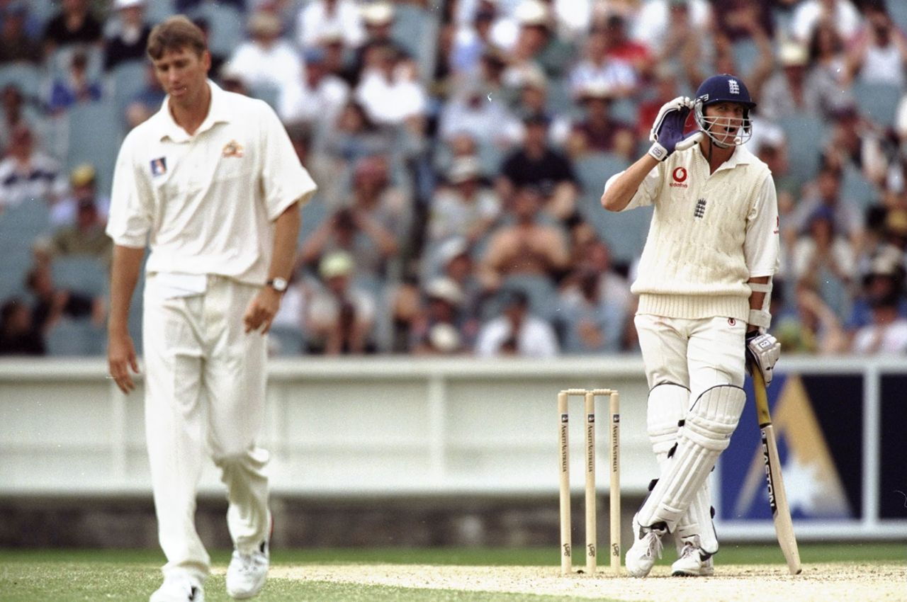 Alan Mullally cups his hand to his ear as Glenn McGrath walks away, Australia v England, fourth Test, day four, Melbourne, December 29, 1998