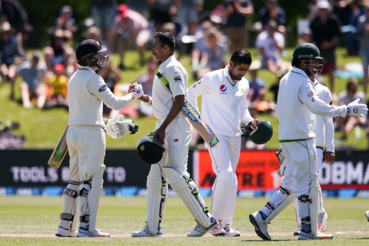 Jeet Raval is congratulated by Henry Nicholls after he hit the winning runs, New Zealand v Pakistan, 1st Test, Christchurch, 4th day, November 20, 2016
