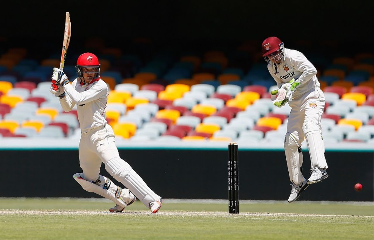 Alex Carey cuts during his half-century, Queensland v South Australia, Sheffield Shield 2016-17, Brisbane, 4th day, November 20, 2016