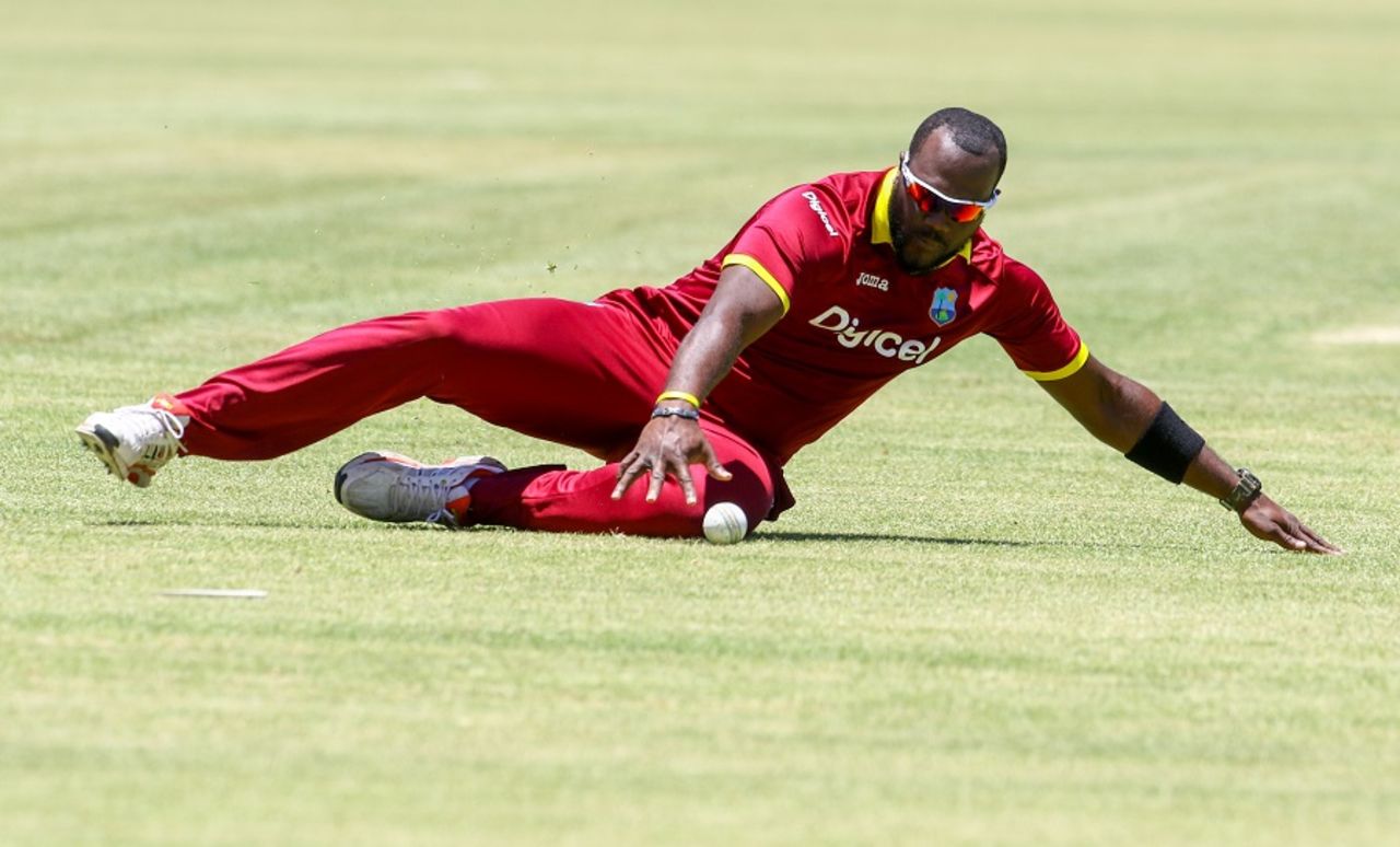 Ashley Nurse slides to stop the ball, Sri Lanka v West Indies, tri-series, Bulawayo, November 23, 2016