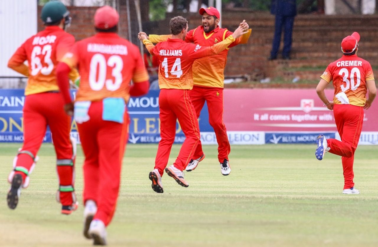 Zimbabwe's players celebrate after taking a wicket, Zimbabwe v West Indies, tri-series, Bulawayo, November 25, 2016