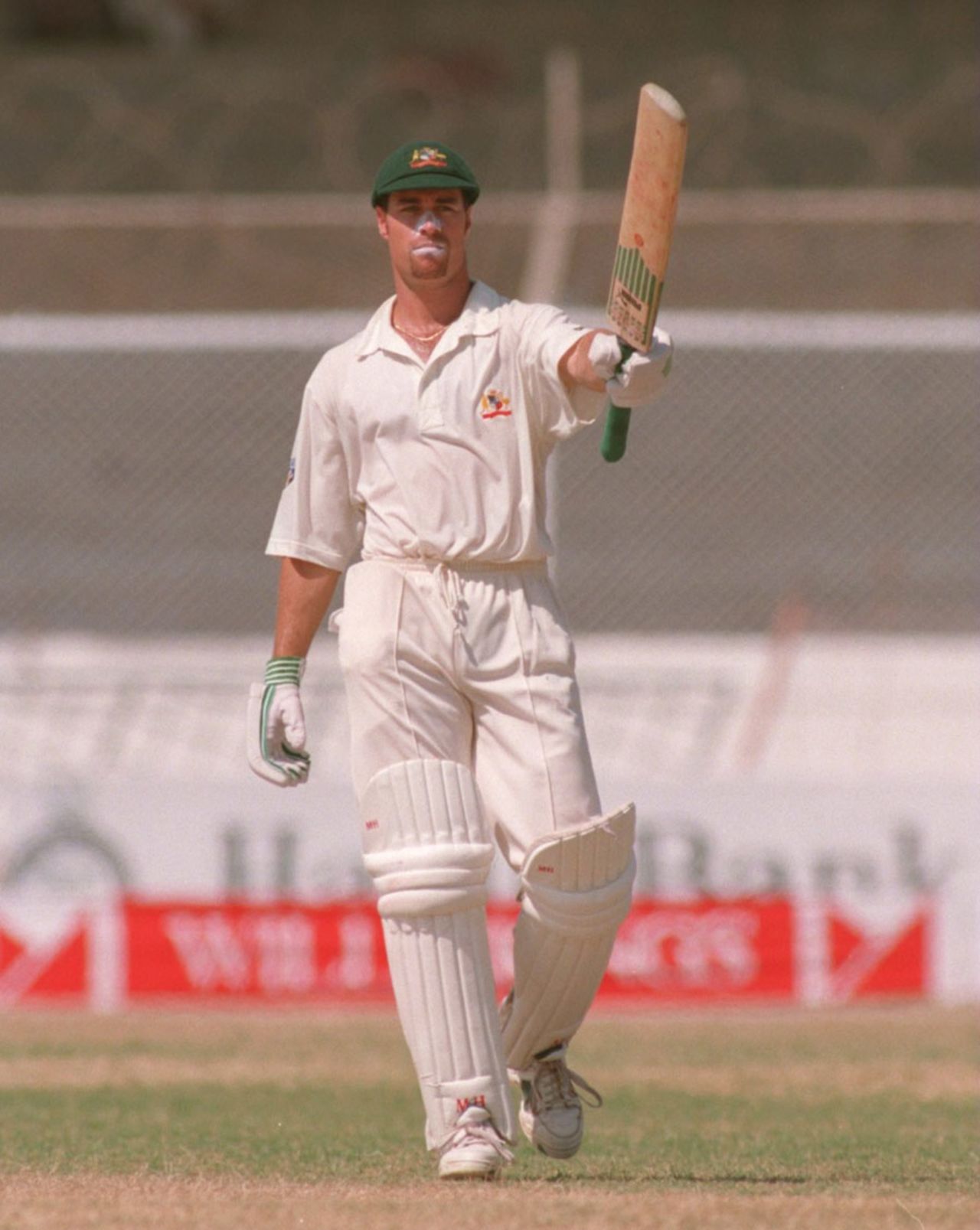 Michael Bevan raises his bat after a half-century on Test debut, Pakistan v Australia, 1st Test, Karachi, September 28, 1994