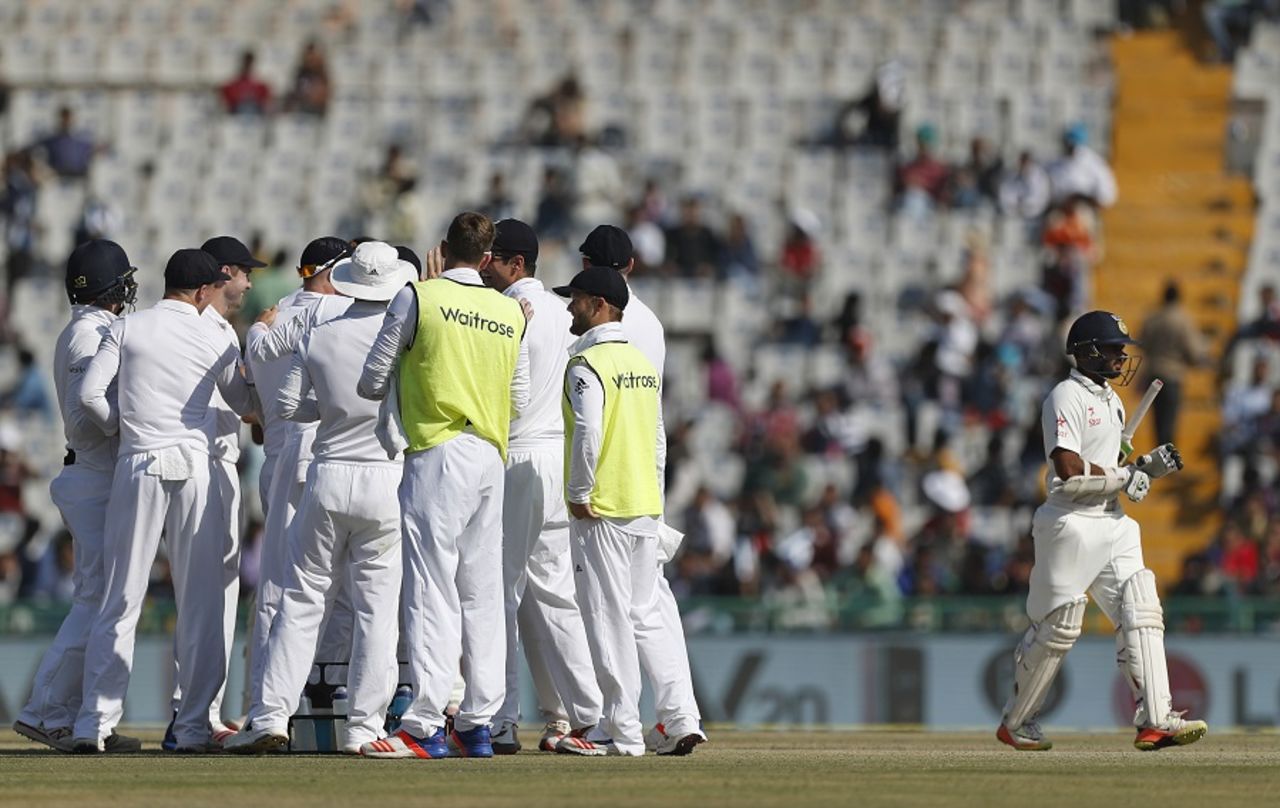 England players regroup after Parthiv Patel is dismissed by Adil Rashid, India v England, 3rd Test, Mohali, 2nd day, November 27, 2016