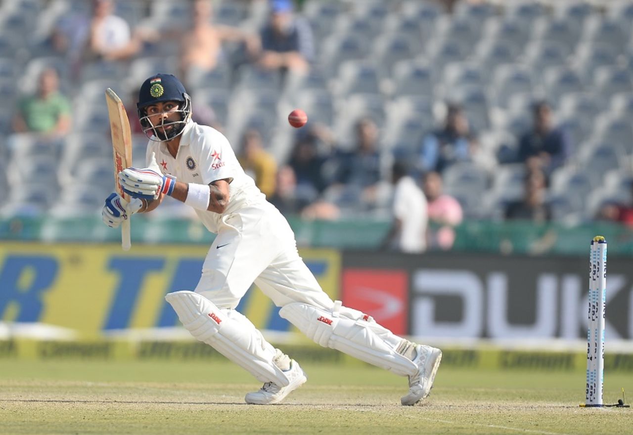 Virat Kohli looks for a run after playing to the leg side, India v England, 3rd Test, Mohali, 2nd day, November 27, 2016