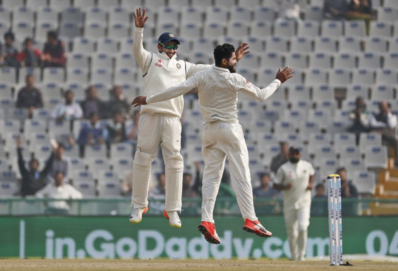 Ravindra Jadeja and Karun Nair are on a high after the wicket of Joe Root, India v England, 3rd Test, Mohali, 4th day, November 29, 2016