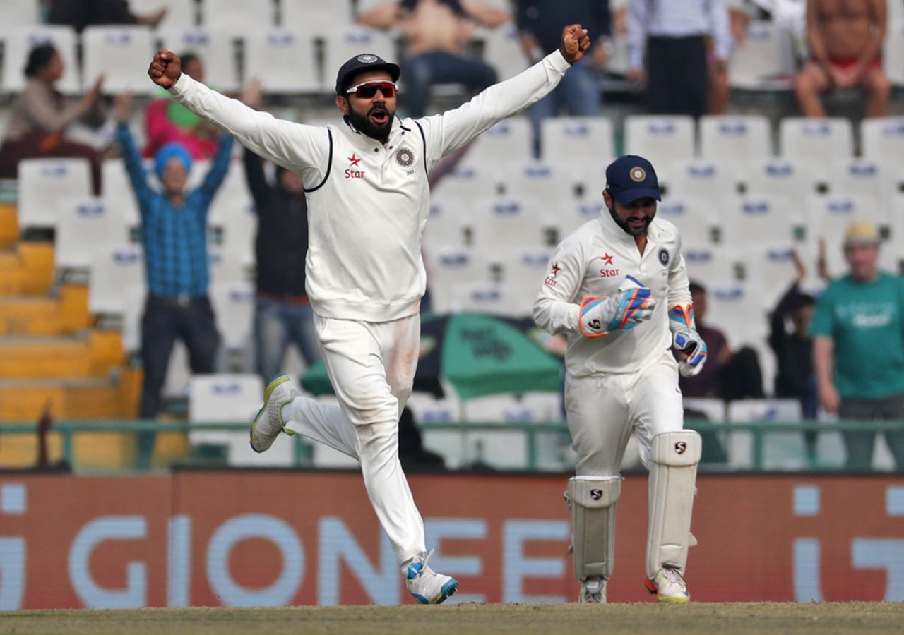 Virat Kohli is elated after the wicket of Adil Rashid, India v England, 3rd Test, Mohali, 4th day, November 29, 2016