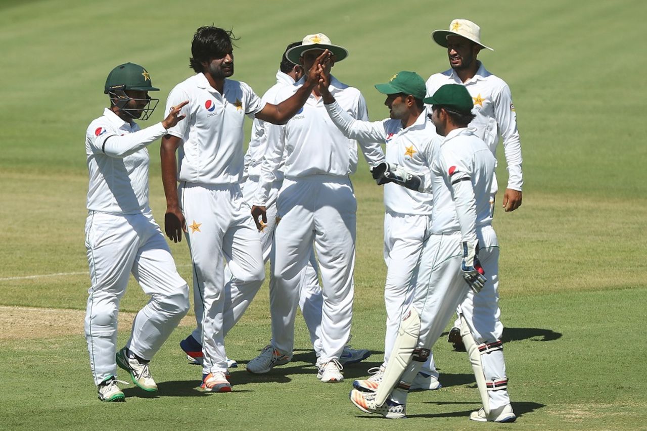 Rahat Ali is congratulated on a wicket, Cricket Australia XI v Pakistanis, Cairns, 2nd day, December 9, 2016