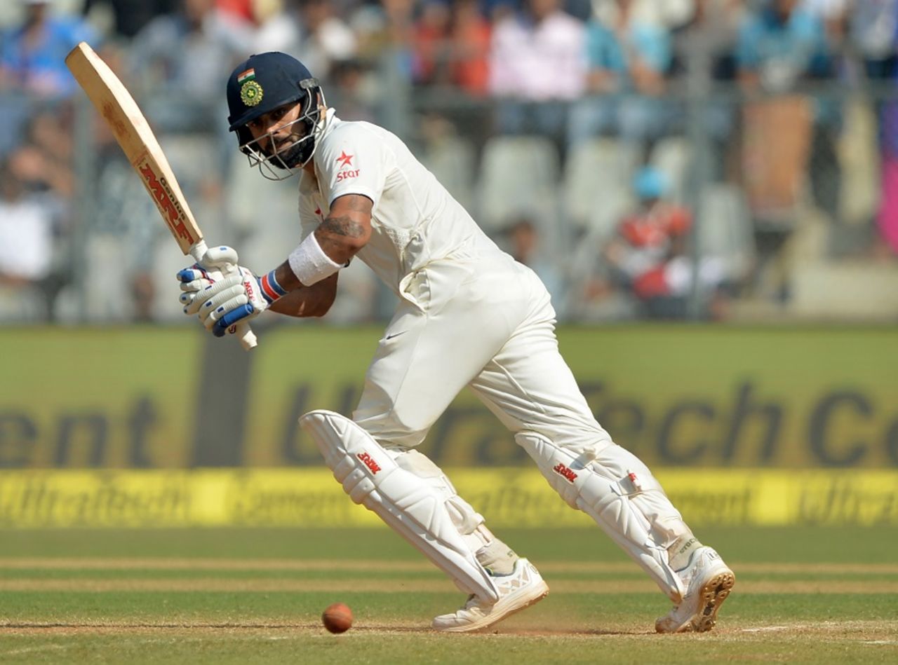 Virat Kohli whips the ball through the leg side, India v England, 4th Test, Mumbai, 3rd day, December 10, 2016