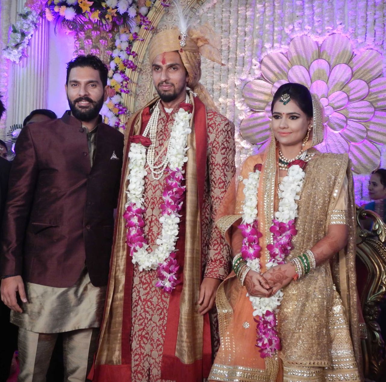 Yuvraj Singh with Ishant Sharma and basketball player Pratima Singh at their wedding reception, Delhi, December 9, 2016