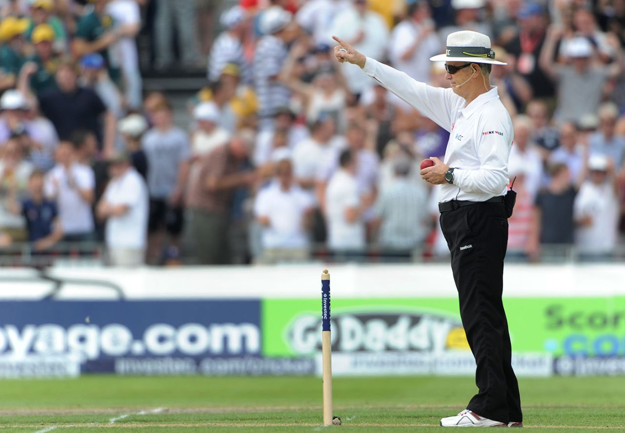 Umpire Tony Hill raises his finger, England v Australia, 3rd Investec Test, Old Trafford, 1st day, August 1, 2013