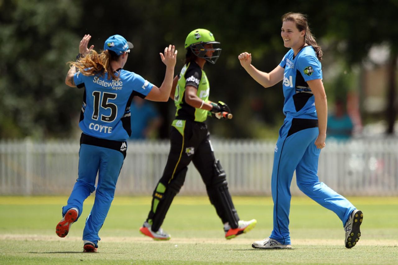 Tahlia McGrath celebrates one of her two wickets with Sarah Coyte, Sydney Thunder v Adelaide Strikers, Women's Big Bash League, Sydney, December 17, 2016