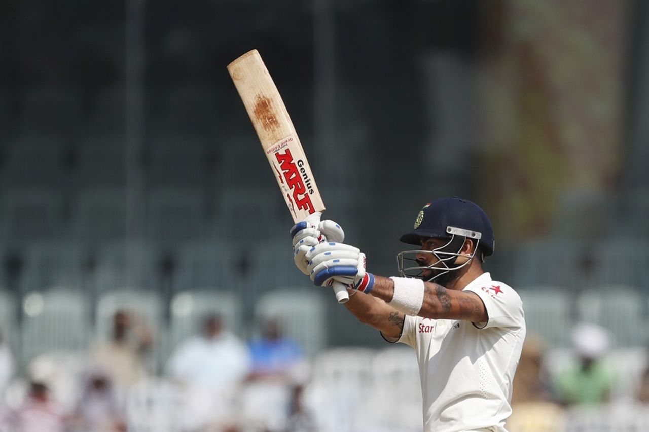Virat Kohli follows through after a pull shot, India v England, 5th Test, Chennai, 3rd day, December 18, 2016