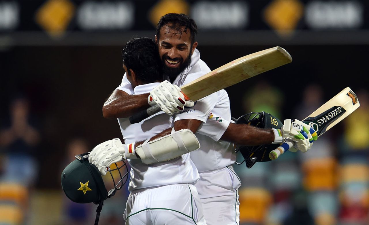 Asad Shafiq gets a big hug from Wahab Riaz on completing his hundred, after running three to complete his ton, Australia v Pakistan, 1st Test, Brisbane, 4th day, December 18, 2016