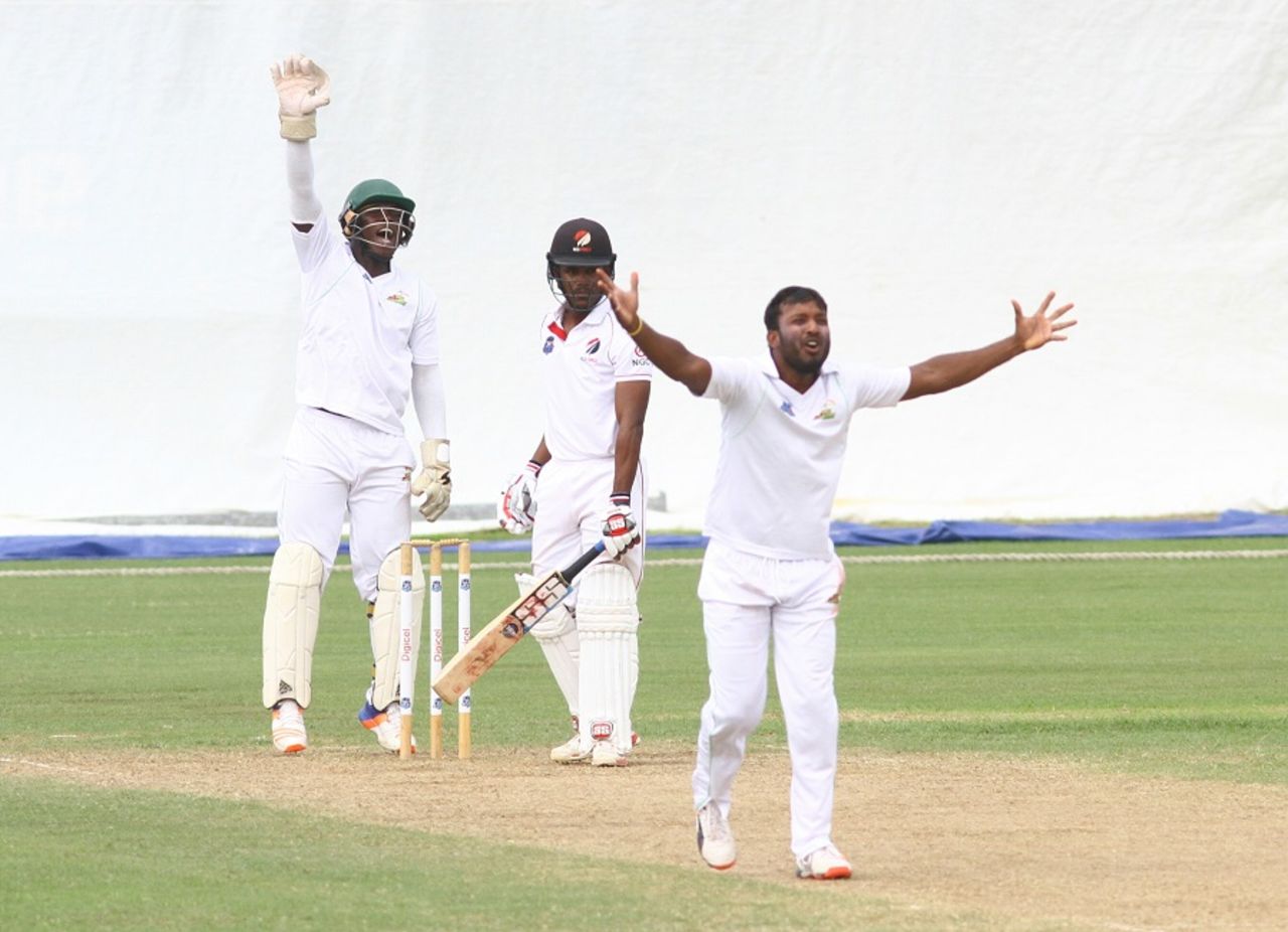 Veerasammy Permaul and Anthony Bramble appeal to the umpire, Guyana v Trinidad & Tobago, Regional 4 Day Tournament, Providence, 4th day, December 19, 2016