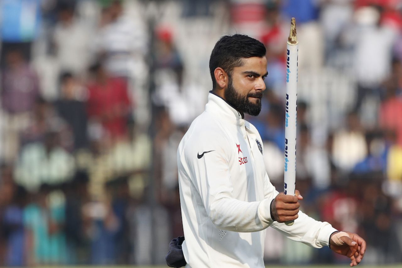 Virat Kohli takes a souvenir with him, India v England, 5th Test, Chennai, 5th day, December 20, 2016