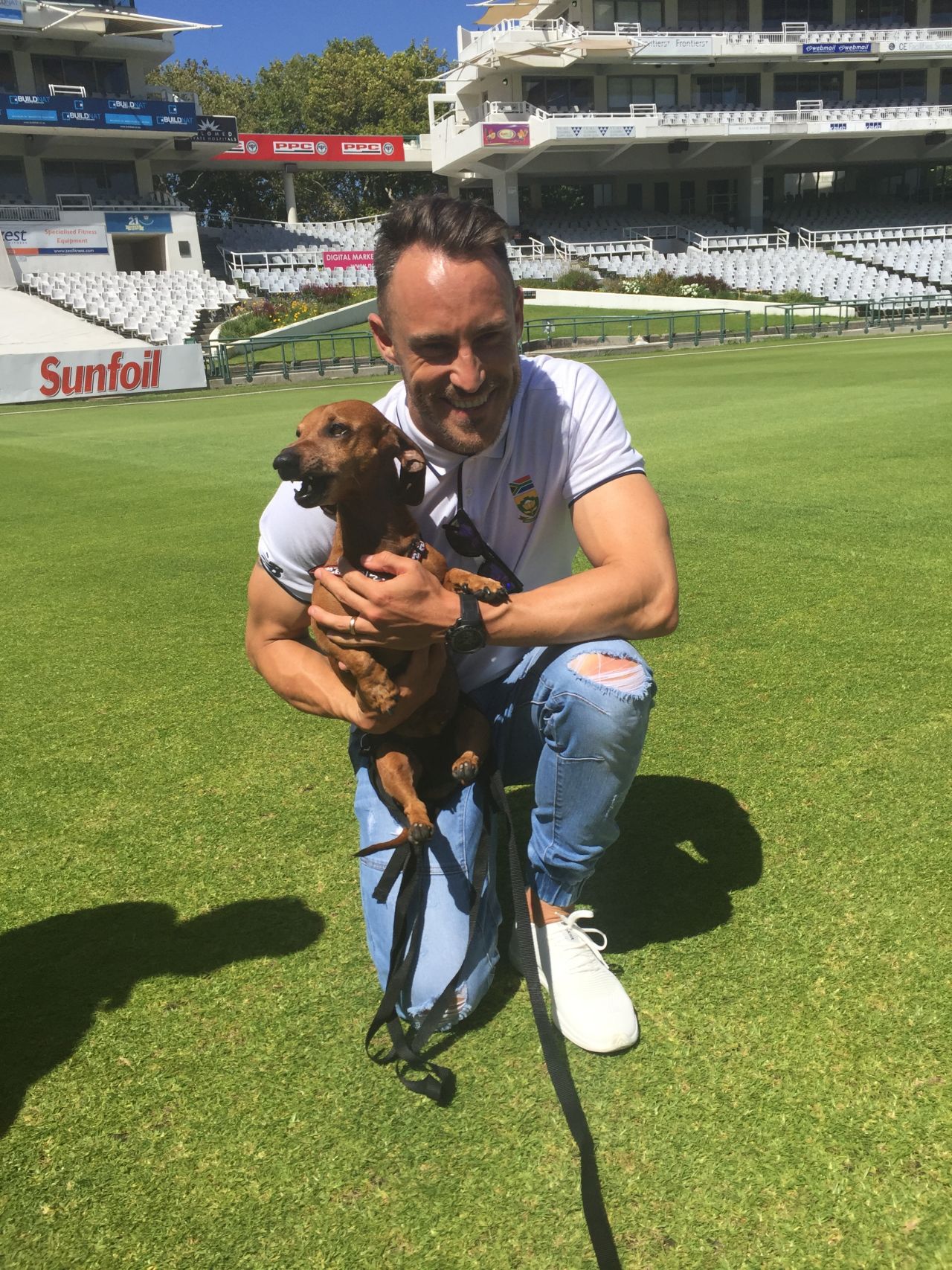 Say woof: Faf du Plessis and his dog Giorgio pose for the cameras, Cape Town, December 14, 2016
