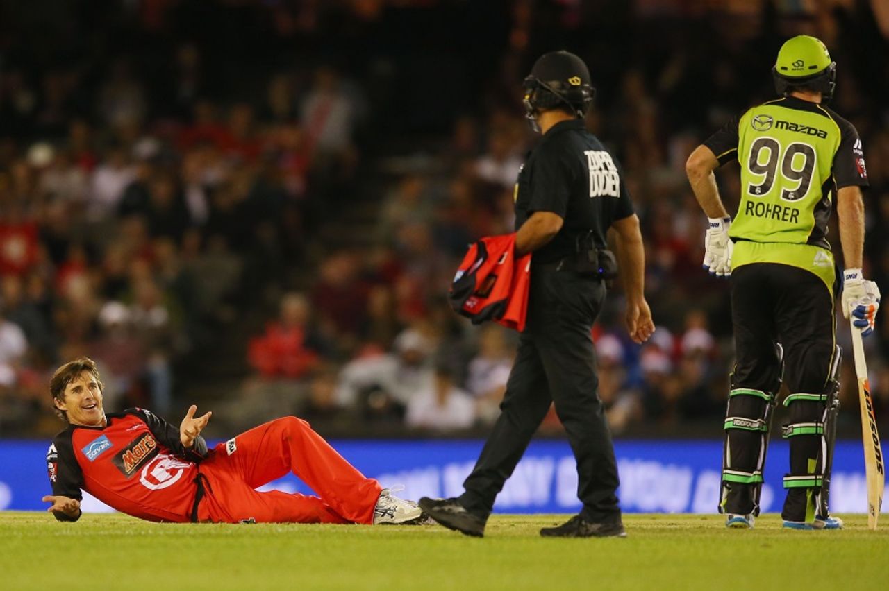 Brad Hogg falls over as he makes an appeal, Melbourne Renegades v Sydney Thunder, Big Bash League 2016-17, Melbourne, December 22, 2016