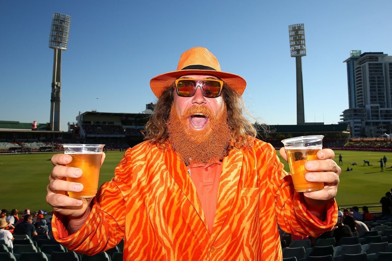 A Perth Scorchers fan strikes a pose before play, Perth Scorchers v Adelaide Strikers, Big Bash League, Perth, December 23, 2016