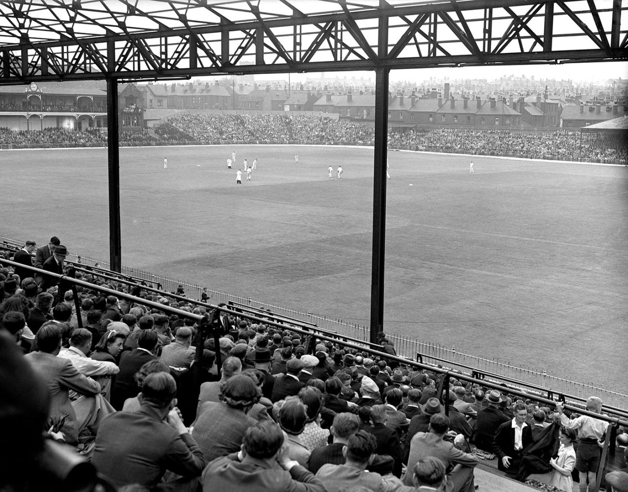 Spectators sit in a bomb-damaged stand, England v Australian Services, Bramall Lane, 1st day, June 23, 1945