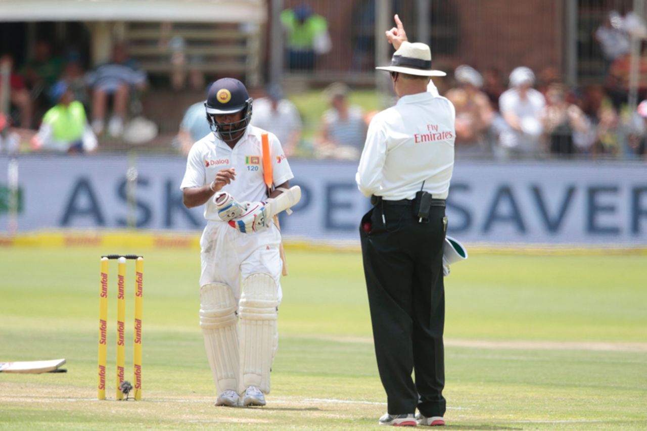 Kaushal Silva walks back after an unsuccessful review, South Africa v Sri Lanka, 1st Test, Port Elizabeth, 2nd day, December 27, 2016