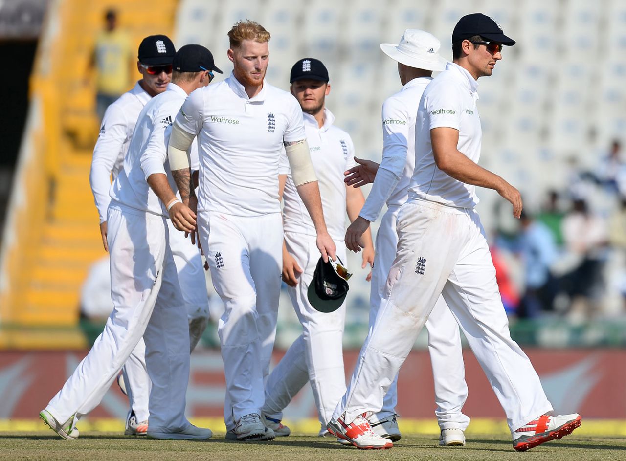 Ben Stokes, Alastair Cook and other England players walk back to the pavilion at the end of India's innings, India v England, 3rd Test, Mohali, 3rd day, November 28, 2016