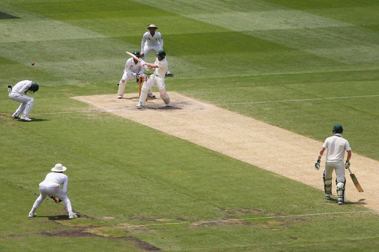 Matthew Wade hits a pull shot straight onto Azhar Ali's helmet at short leg, after dismissing the batsman, Australia v Pakistan, 2nd Test, 4th day, Melbourne, December 29, 2016
