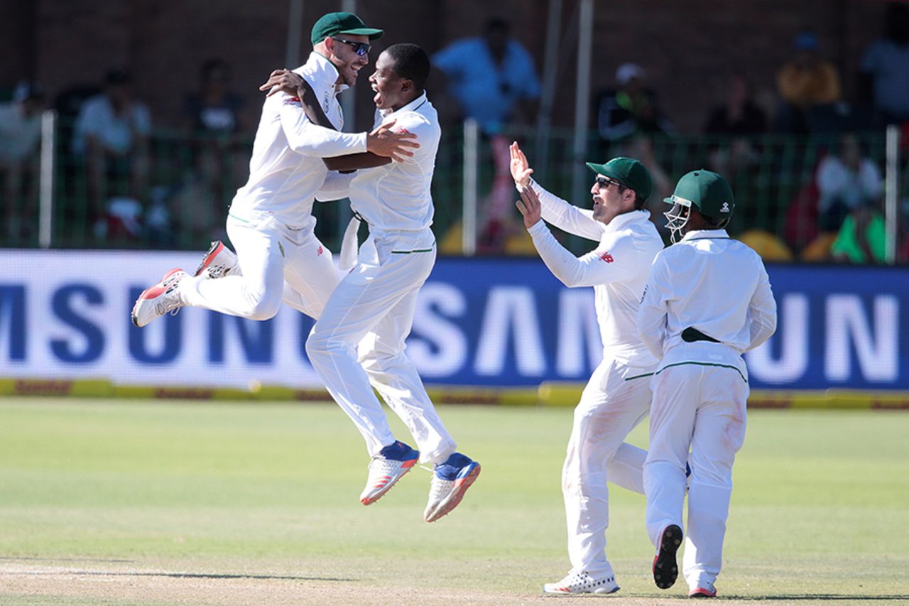 Faf du Plessis and Kagiso Rabada leap around in joy after Kusal Mendis' wicket, South Africa v Sri Lanka, 1st Test, Port Elizabeth, 4th day, December 29, 2016