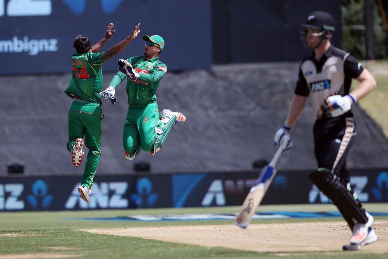 Rubel Hossain and Nurul Hasan celebrate a wicket, New Zealand v Bangladesh, 3rd T20I, Mount Maunganui, January 8, 2017