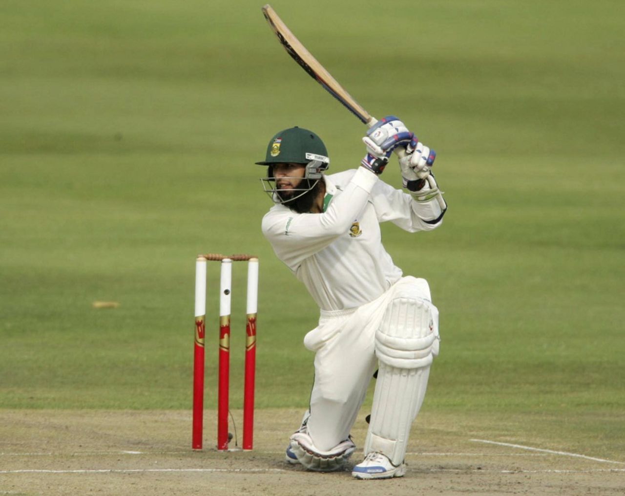 Hashim Amla crunches a drive through cover, South Africa v New Zealand, 2nd Test, Cape Town, April 29, 2006