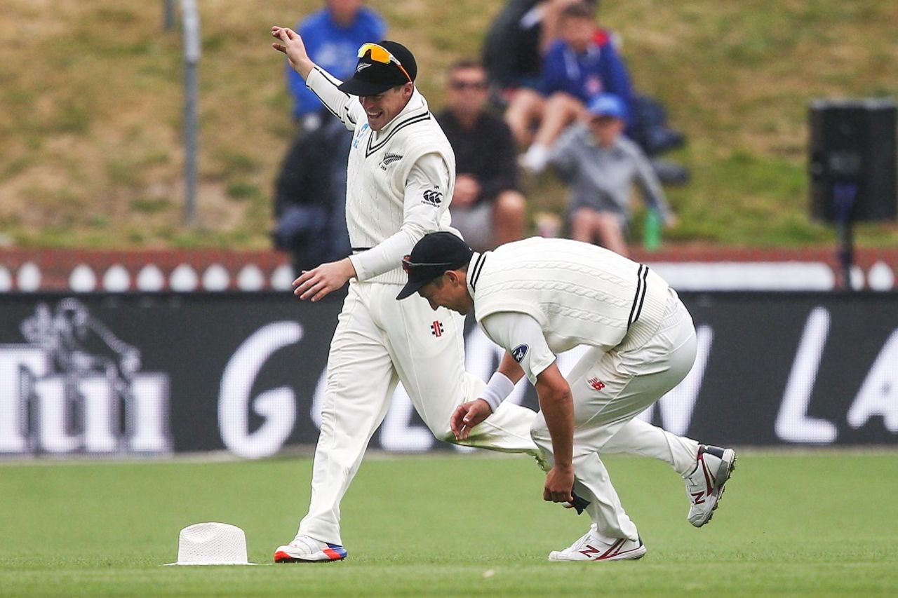 Trent Boult and Henry Nicholls compete to retrieve the umpire's hat, New Zealand v Bangladesh, 1st Test, Wellington, 1st day, January 12, 2017