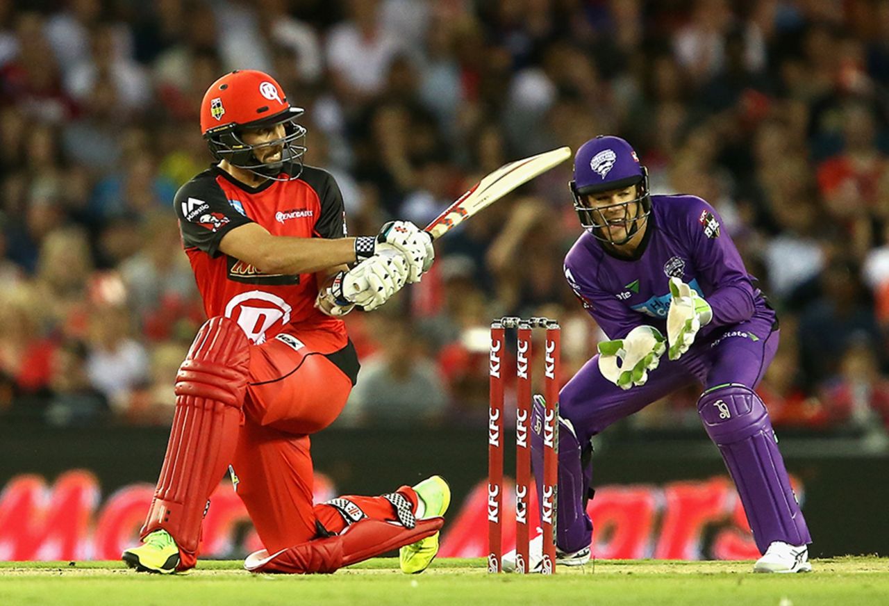 Tom Cooper plays a sweep during his unbeaten 24-ball 53, Melbourne Renegades v Hobart Hurricanes, BBL 2016-17, Melbourne, January 12, 2017